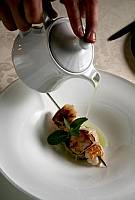 Orta San Giulio (Novara) Villa Crespi ,Capesante e scampi cipollotto al limona,infuso di mela verde e  sedano rapa    foto Gianluca Moggi/Massimo Sestini